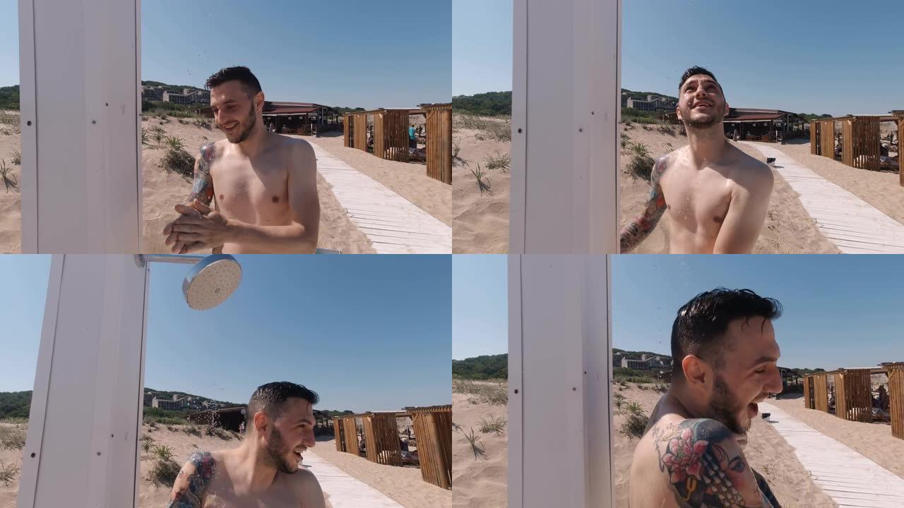 快乐活跃的男人在海滩上洗冷水澡，笑着玩