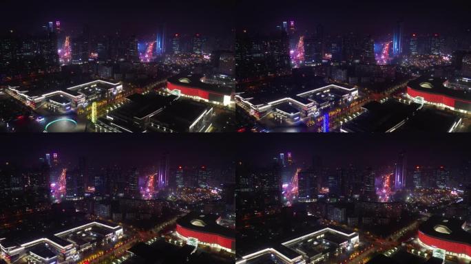 夜间照明青岛市著名海湾广场交通市中心街道空中全景4k中国