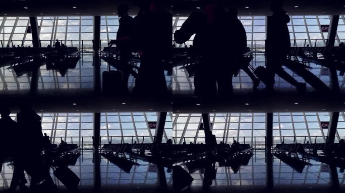 无法识别的人坐在马略卡岛机场的椅子上行走