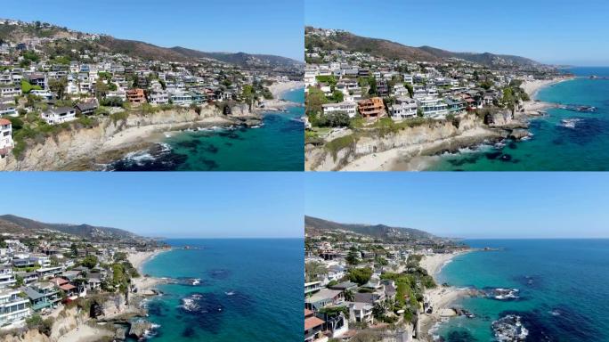 加州悬崖上的拉古纳海滩海岸线城镇富裕别墅的鸟瞰图
