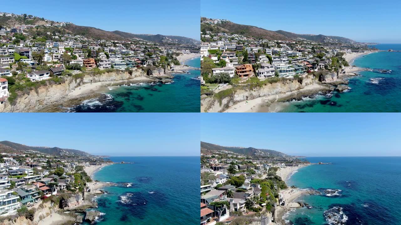 加州悬崖上的拉古纳海滩海岸线城镇富裕别墅的鸟瞰图