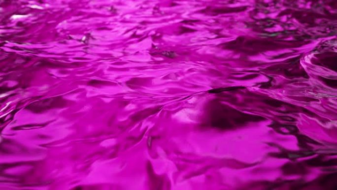 池中带有光线反射的纯净紫色水。慢动作。无缝循环3d渲染。