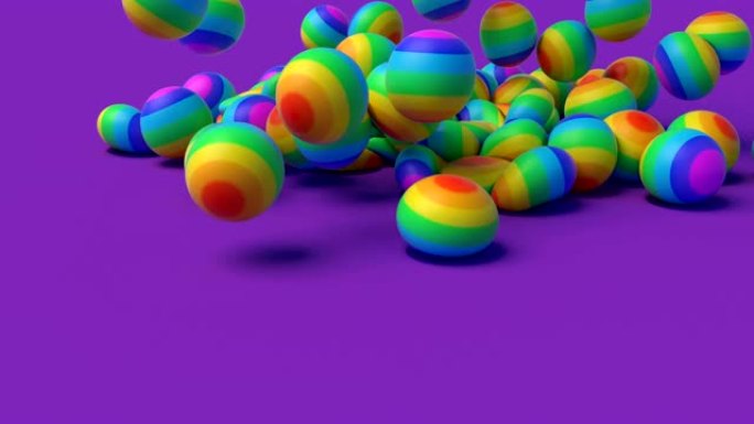 LGBT彩虹橡胶球落在淡紫色表面简约封面素材4k