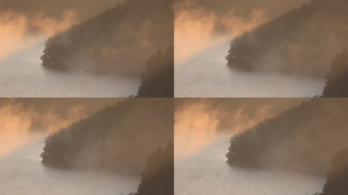 金色晨雾环绕峡湾