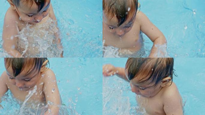 可爱的小孩在庭院的蓝色街道游泳池洗澡。快乐蹒跚学步的肖像，宝贝。孩子笑，泼水，笑。健康生活方式、家庭