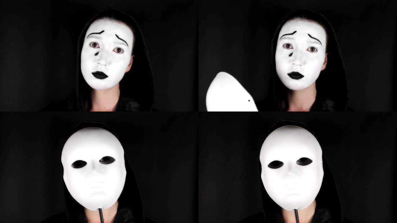 布鲁内特戴上白色剧院面具。戏剧化妆悲伤面具。