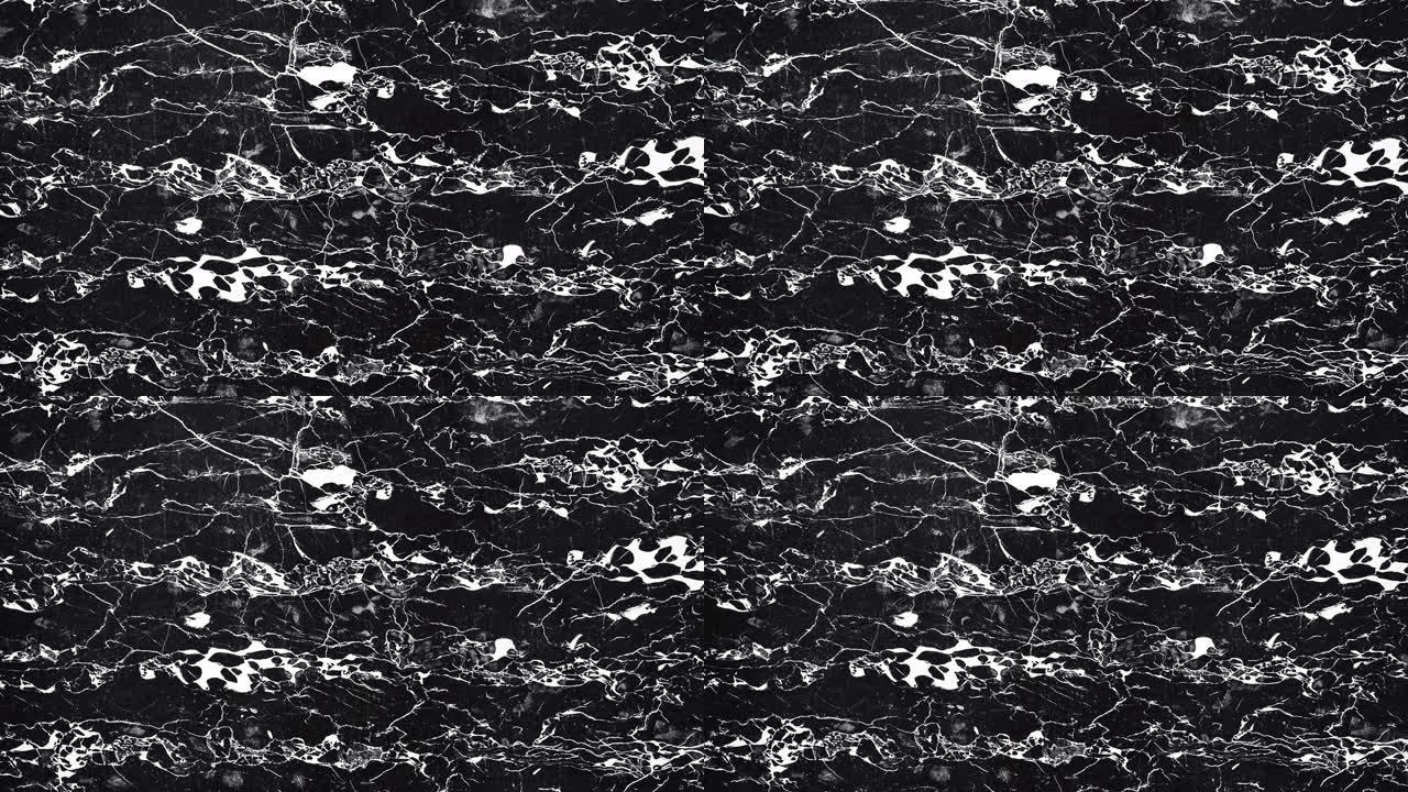 黑色大理石，白色有小裂缝。天然石材的纹理背景。多莉相机运动