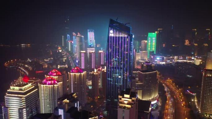 青岛市夜间照明秀市中心交通街湾空中全景4k中国