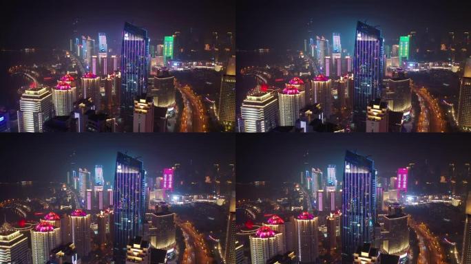 青岛市夜间照明秀市中心交通街湾空中全景4k中国