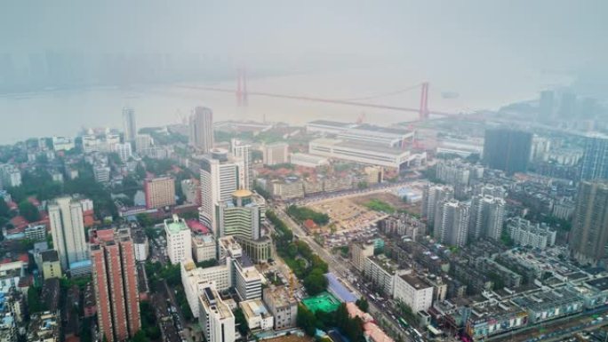中国阴天时间武汉城市景观河畔航空全景4k延时