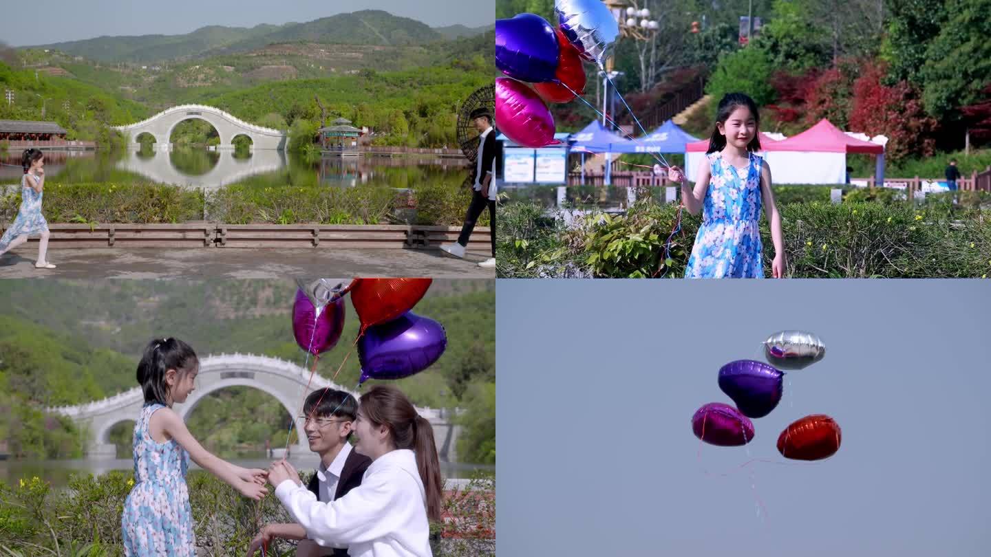 情侣偶遇小女孩放飞气球
