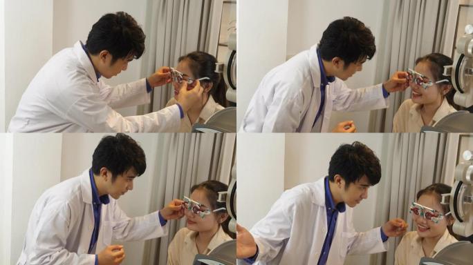 男性验光师使用光学试验镜架检查女性视力，而男性眼科医生在脸上戴着镜片尝试试验镜架并提问