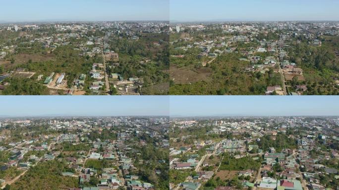 在越南中部高地地区的l â m đ ồ ng省的b ả o l ê c郊区高空飞行。飞越朝向城市的房