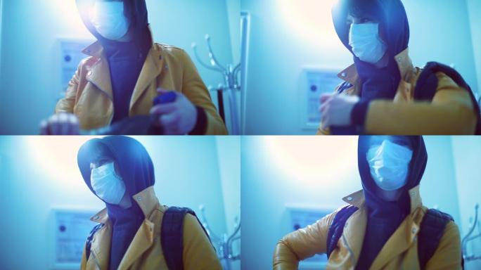 一名戴着医用口罩的妇女到达医院接受冠状病毒检查。