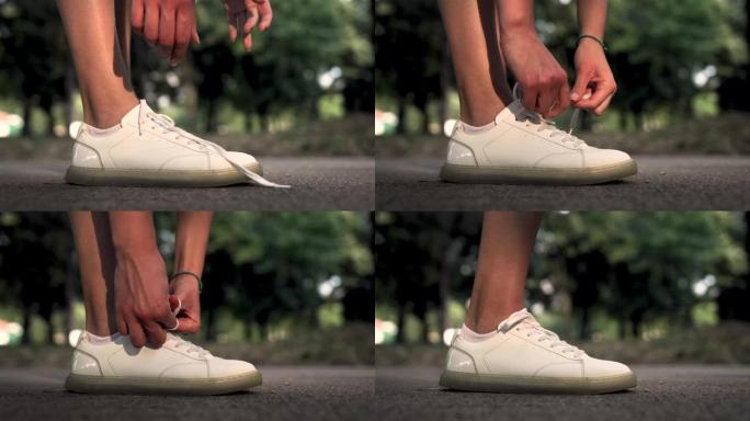 适合年轻女性在白色运动鞋上打字鞋带