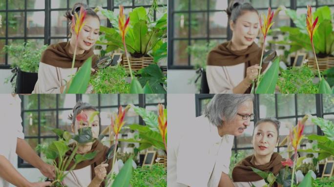 亚洲夫妇在家中温室种植高级植物，家庭教育概念
