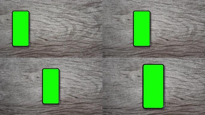 智能手机绿屏和木质纹理背景