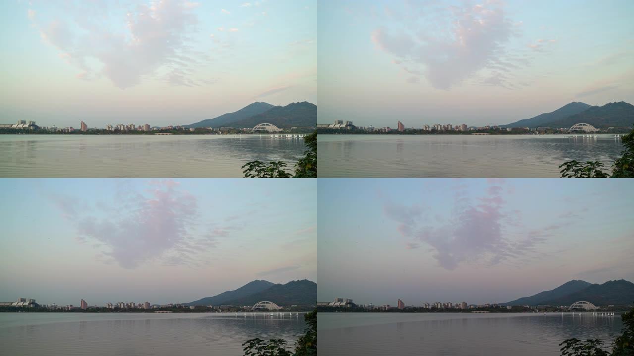 日落时间南京市著名湖滨公园海湾帆船训练全景延时4k中国