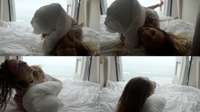 年轻女子躺在货车上的床上，可以看到海岸景色。货车生活，乘货车旅行的女人。另类生活概念