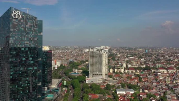 阳光灿烂的雅加达市市中心交通街航空全景4k印度尼西亚
