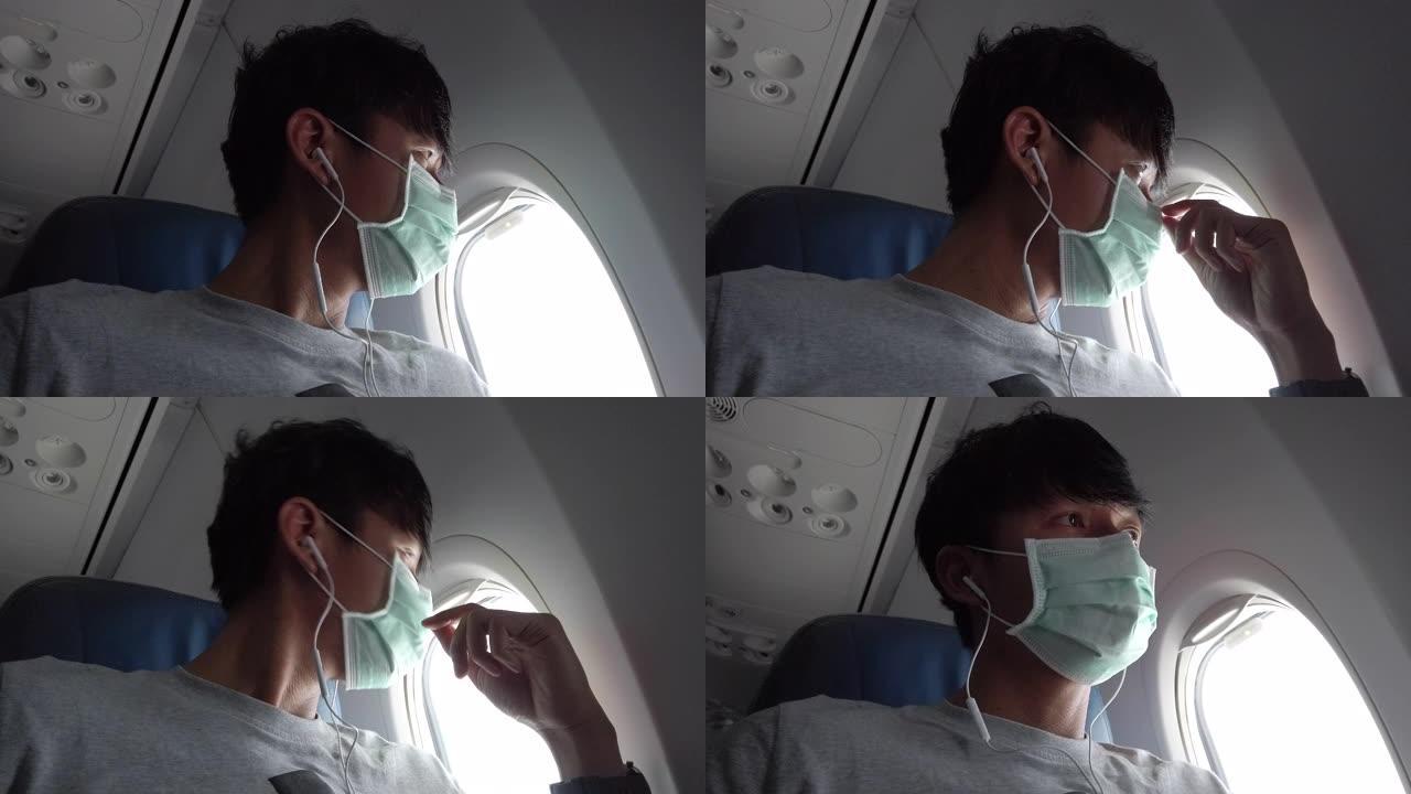 男子在冠状病毒流行期间乘飞机旅行