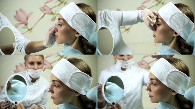鼻形矫正。女人看着镜子，检查整形手术后愈合的脸，效果惊人。高清