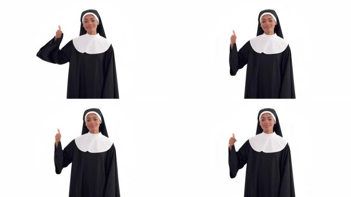 黑人修女的肖像看着相机，竖起大拇指。孤立在白色背景上
