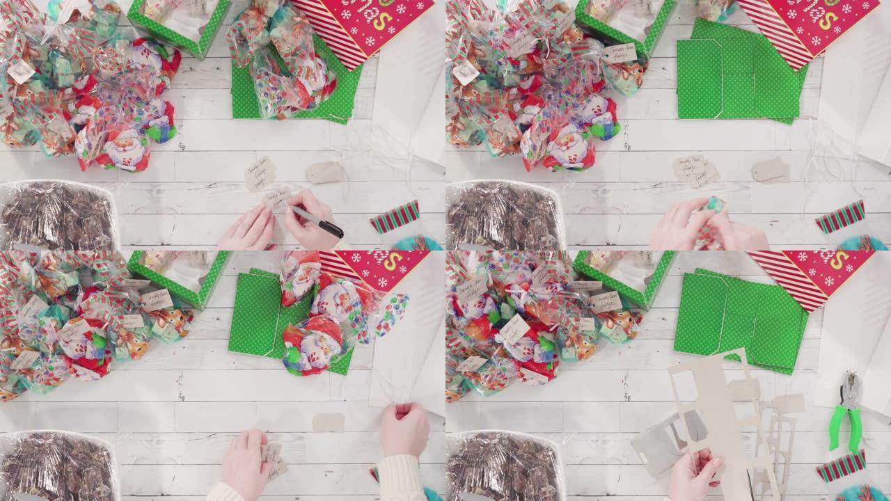 将自制澳洲坚果软糖包装成小礼品袋。