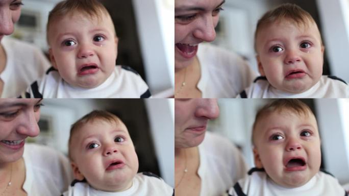 心烦意乱的婴儿蹒跚学步的脸哭泣