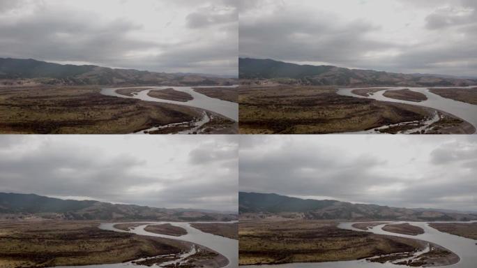 乌兰乌德市附近西伯利亚河流和丘陵的鸟瞰图。4k镜头