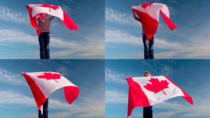 4k。夏天，金发男孩在蓝天上户外挥舞加拿大国旗 -- 加拿大日，国家，爱国主义，独立日7月1日
