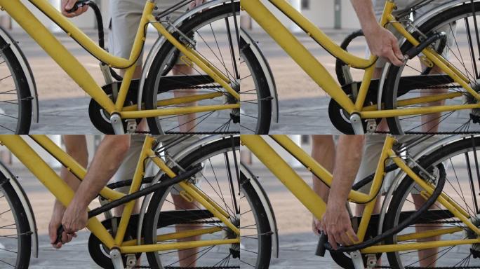 通过插入链条并用慢动作的钥匙将其锁定来保护自行车免受盗窃