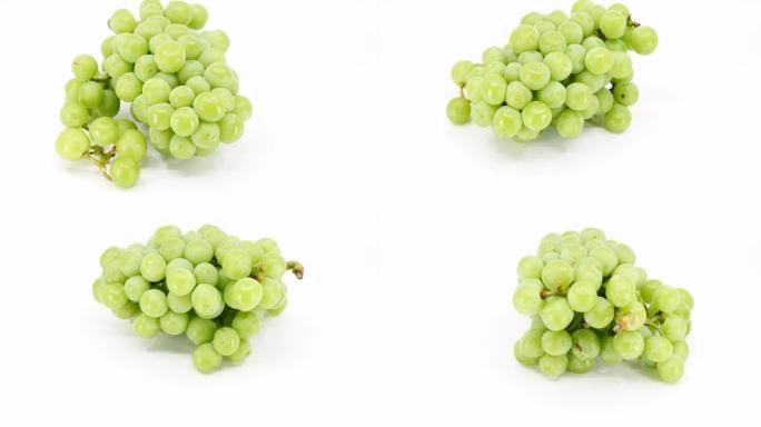 白色背景上的新鲜绿色葡萄水果，视频片段。