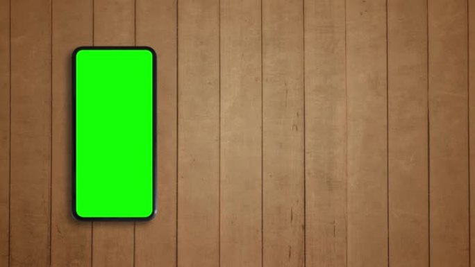 智能手机绿屏和木质纹理背景