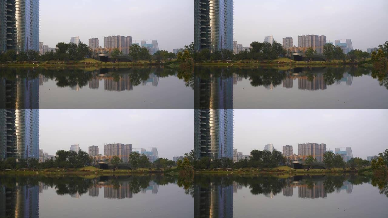 日落时间成都市著名现代公寓住宅湖全景4k中国