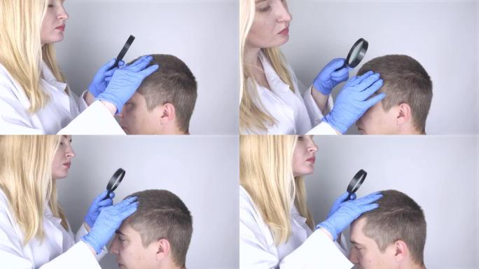 毛发学家正在检查一个开始脱发的人的头发。咨询皮肤科医生。脱发、脱发、瘙痒、头部燃烧或皮脂溢出