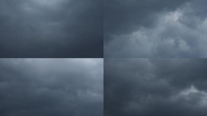 天空和乌云的镜头。深灰色的暴风云。戏剧性的天空。旋转的云，气团。美丽的自然时光流逝日落时分的暴风云。