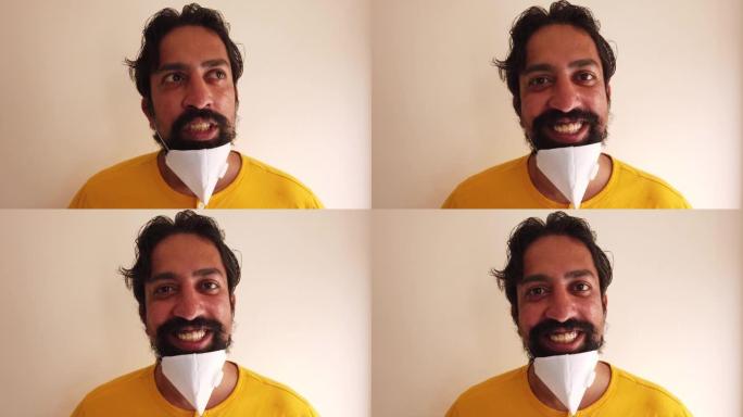 印度男性单身在工作室戴着外科口罩