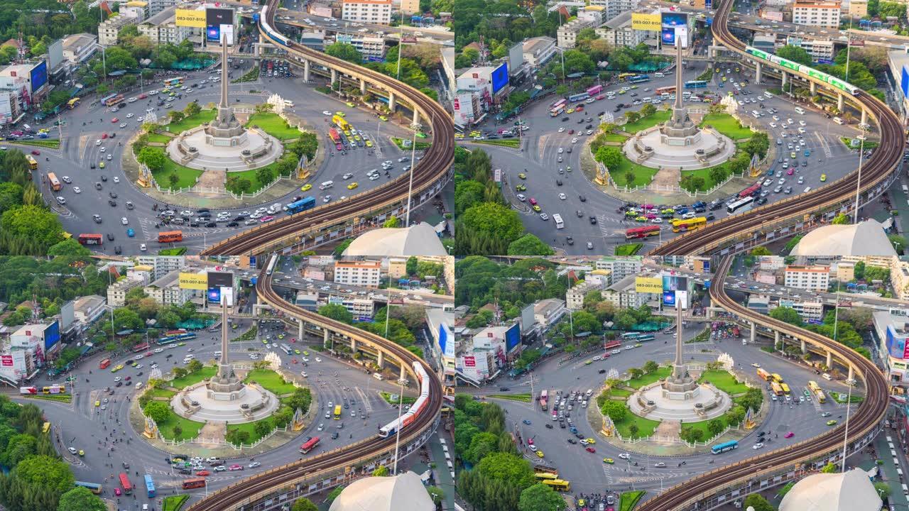 繁忙街道路上胜利纪念碑鸟瞰图的时间流逝。曼谷市中心天际线的环形交叉路口。泰国。智慧城市金融区中心。日