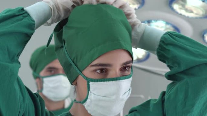 女医生在手术室穿手术服的肖像 (脸部特写)