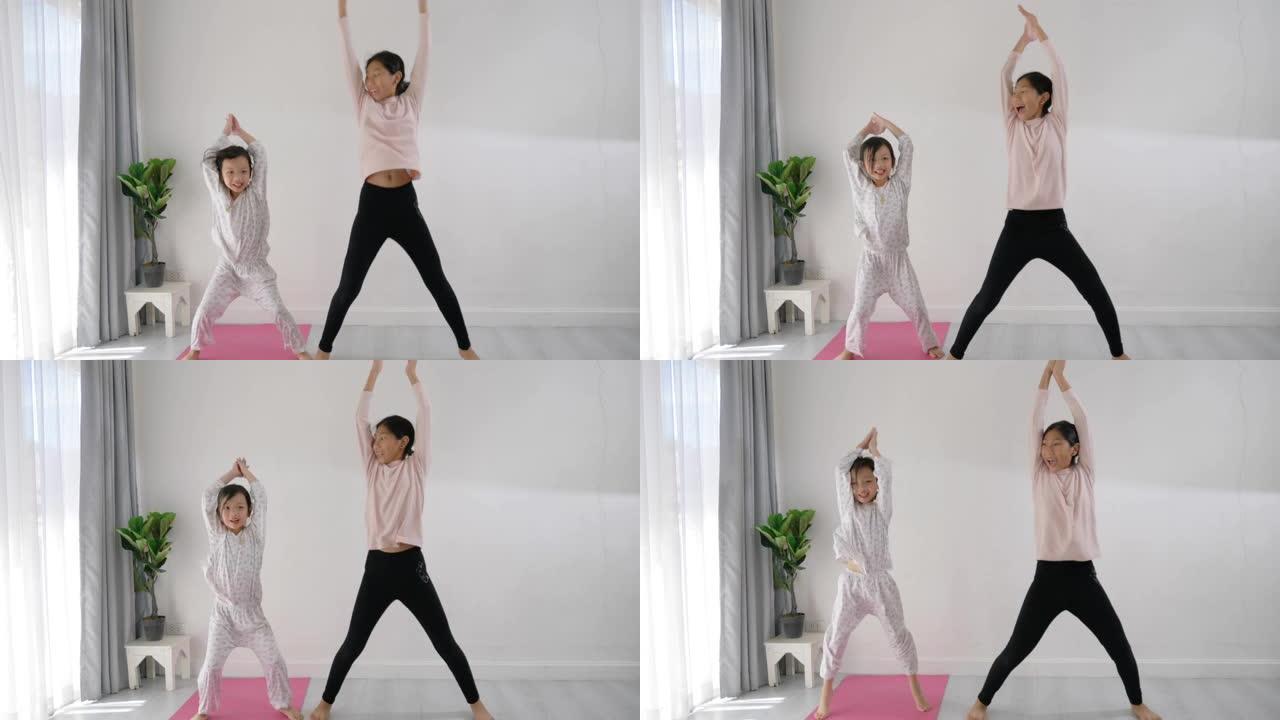 亚洲女孩教妹妹在家锻炼，生活方式。