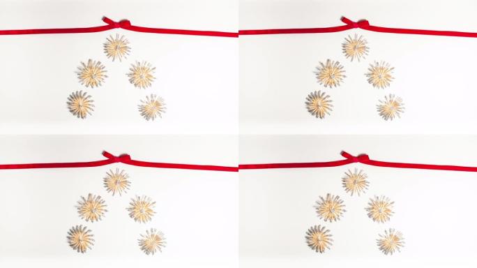 白色圣诞节概念上的红丝带