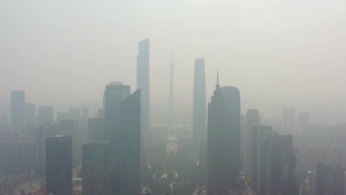 晴天烟雾飞行在广州市中心著名广场空中全景4k中国