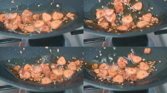 将切成薄片的大蒜炒到锅中，直到金黄酥脆，使蒜片变成4K。