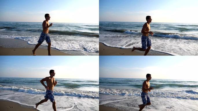 运动帅哥在海岸慢跑，背景是美丽的海景。年轻的运动型男子在晚上沿着海洋海滩奔跑。在海边做运动的男运动员