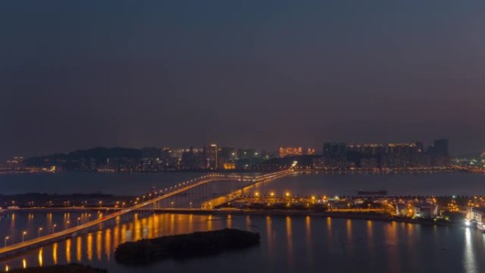 日落黄昏澳门城市景观交通桥屋顶全景4k延时中国