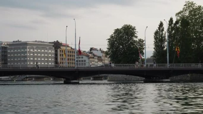日落时间日内瓦市中心湖滨交通桥慢动作全景4k瑞士