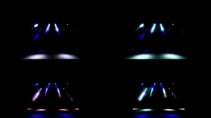明亮的舞台灯。多色音乐会灯光的镜头。