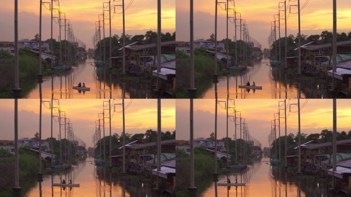 电线杆塔和电缆线和湄南河，在泰国曼谷日落时反射湖泊，能源电气技术和工业概念。