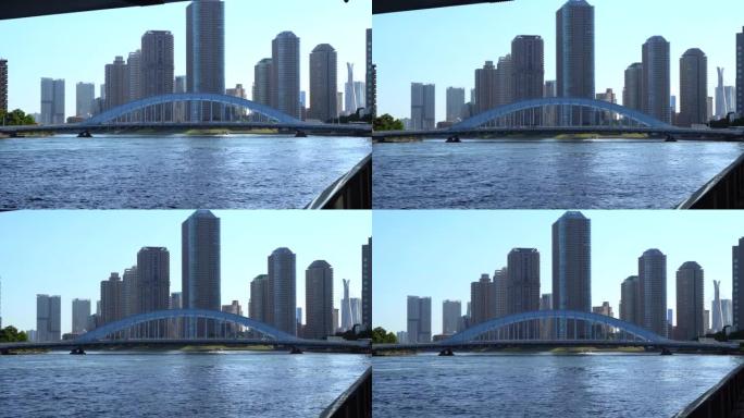 塔公寓和沿隅田川的长廊的Eitai桥。跟踪镜头。